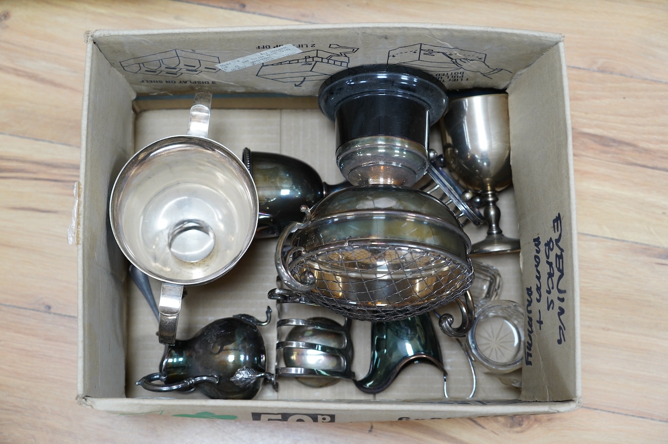 A group of various plated wares to include toast racks, cream jug etc. Condition - fair